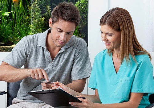 professional explaining to patient 