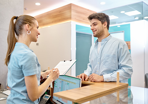 Person looking at dental insurance information on their phone