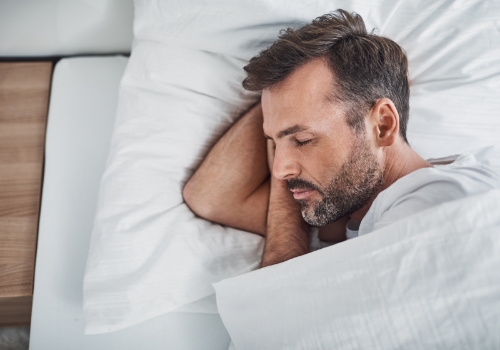 Man sleeping peacefully on his side