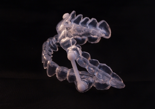 Oral appliance against black background
